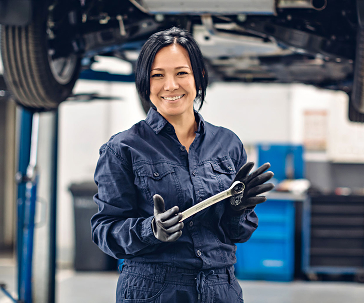 Woman holding wrench staff-5